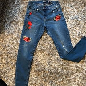 Rose imprinted skinny jeans